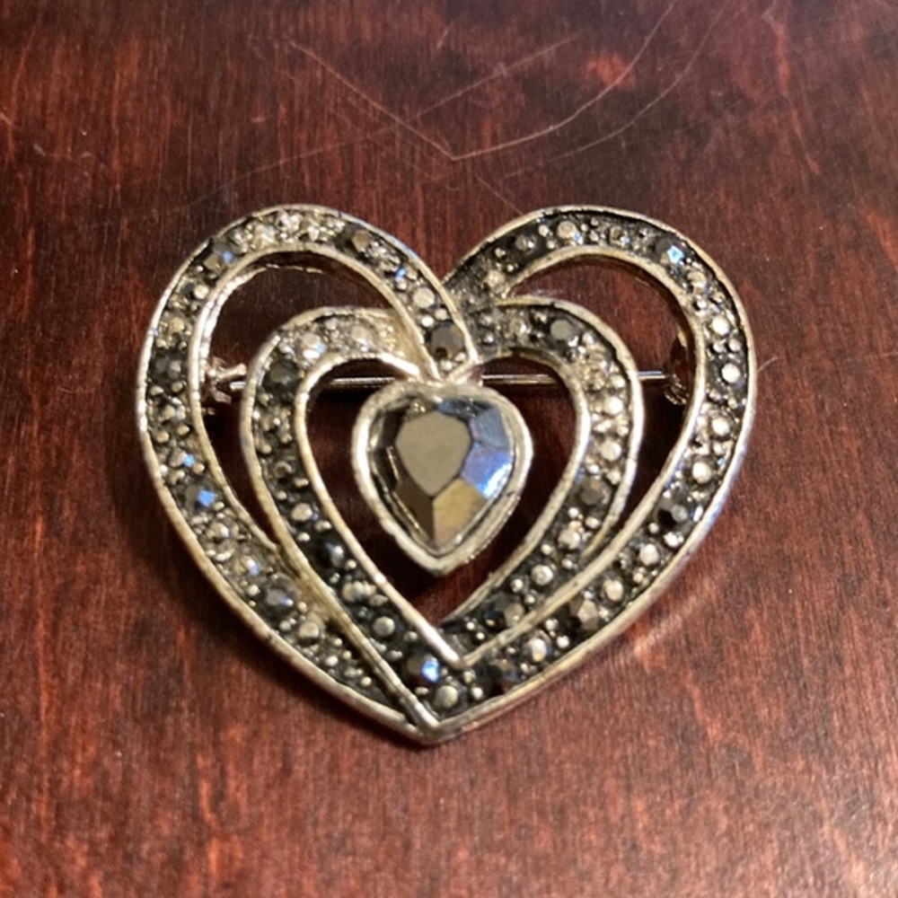 Vintage Lovely silvertone and marcasite interlocked heart brooch